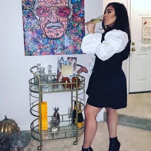 Black bodice and exaggerated sleeve dress